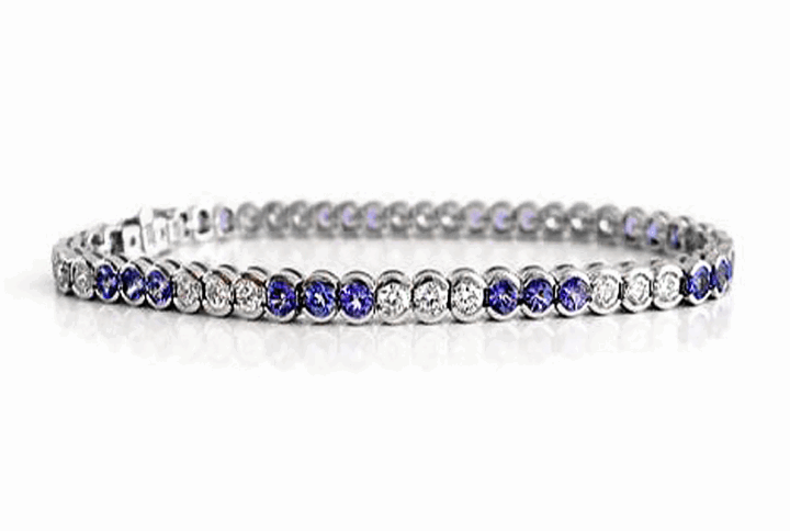 White Gold Tennis Bracelet with Alternating Bezel-set Diamonds and Round Blue Tanzanite Gemstones
