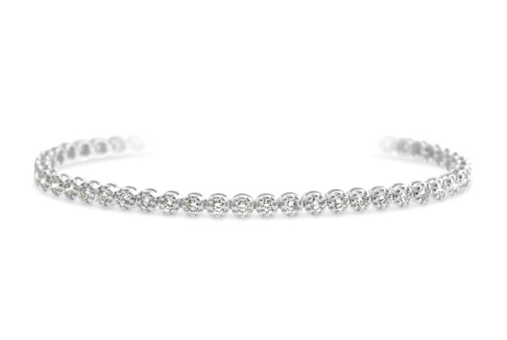 an Open-cuff White Gold Diamond Bracelet Featuring a Continuous Line of Brilliant-cut Diamonds.