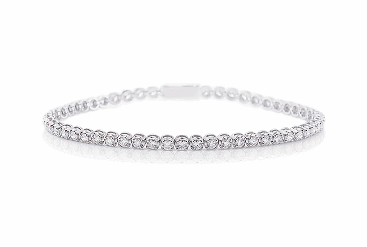 a Delicate and Classic White Gold Tennis Bracelet Featuring a Continuous Line of Brilliant-cut Diamonds.