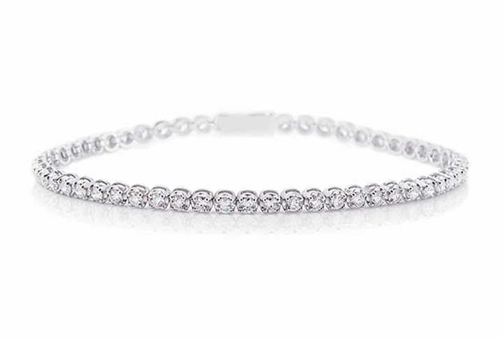 a Delicate and Classic White Gold Tennis Bracelet Featuring a Continuous Line of Brilliant-cut Diamonds.