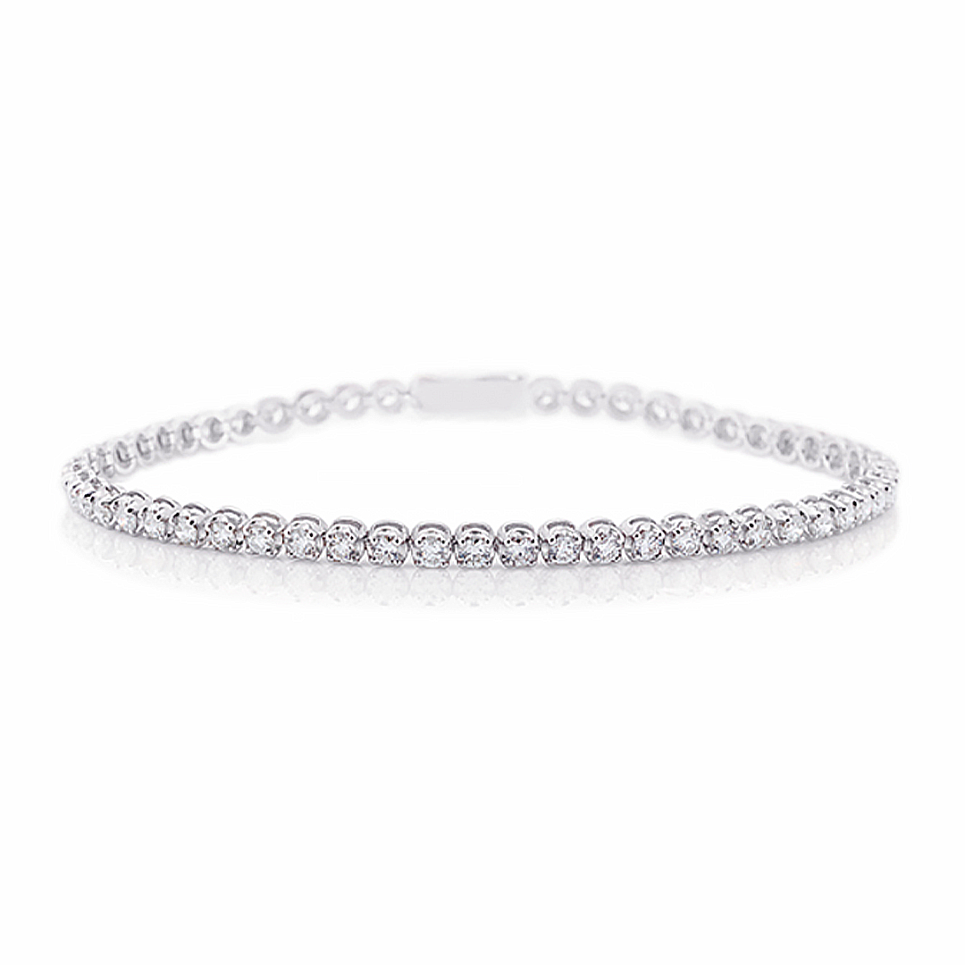 a Delicate and Classic White Gold Tennis Bracelet Featuring a Continuous Line of Brilliant-cut Diamonds.