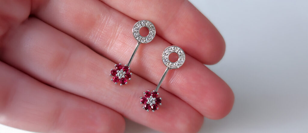 White Gold Diamond and Ruby Drop Earrings – Mark Solomon Jewellers - Mark Solomon Jewellers White Gold Drop Earrings with Round Diamond-set Tops and Ruby Flower Clusters
