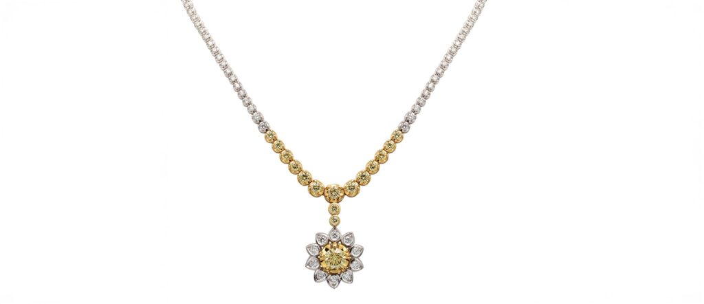 African Sunshine the Story. - Mark Solomon Jewellers Yellow and White Diamonds Set in a Neckpiece Called "african Sunshine". the Neckpiece Looks Like the Sun.