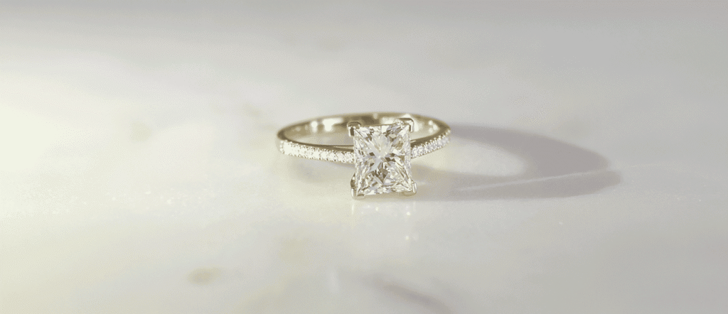 Creating Unique and Meaningful Custom Jewellery 1 - Mark Solomon Jewellers Bespoke Princess-cut Diamond Engagement Ring in Platinum with a Slender Micro-pavé Band at Mark Solomon Jewellers.