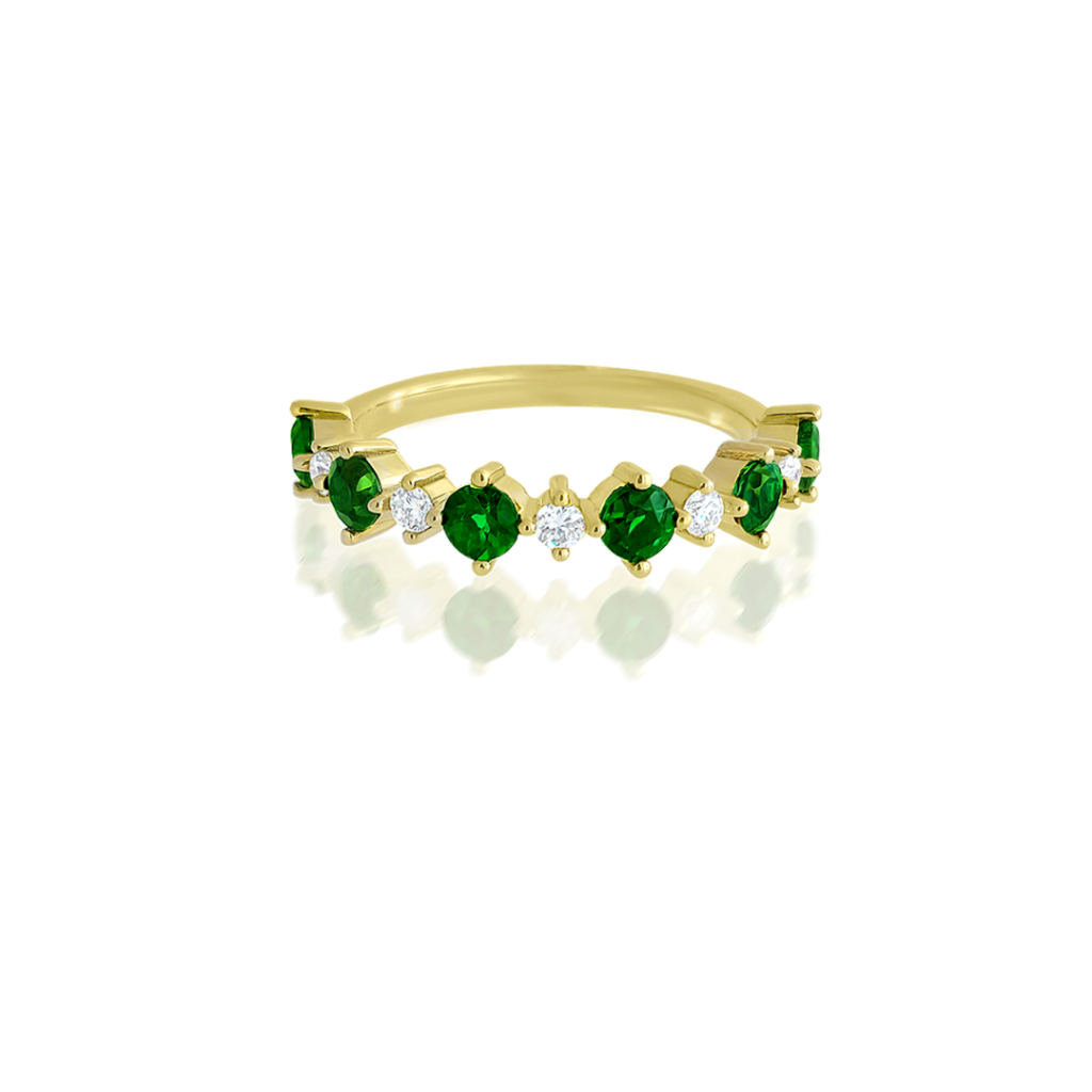 Green Gemstone Jewellery | This Chrome Tourmaline and Diamond Eternity Ring heralds 6 vivid green tourmalines (chrome tourmalines: 0.70ct), accentuated by 5 sparkling round brilliant cut diamonds, (diamonds totalling: 0.147ct, G – H Colour, VS – SI Clarity), set in a 14ct yellow gold half eternity band.

If you’re looking for a bespoke design, consider our custom jewellery offering. We carry a selection of loose tourmaline, with qualified designers and goldsmiths on our premises. Make an appointment for an obligation-free consultation to discuss your dream piece.

