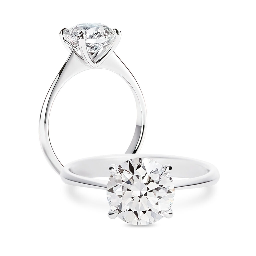 Round Brilliant Cut Diamond Solitaire Engagement Ring in Platinum with Classic Four-prong Setting, Side and Front View.