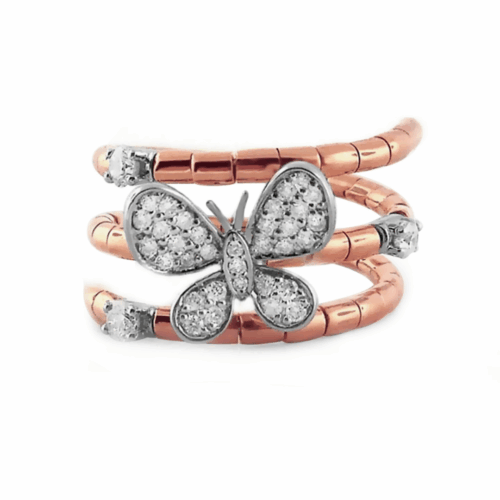 Rose gold coil ring with a white gold diamond butterfly and three individual diamonds.