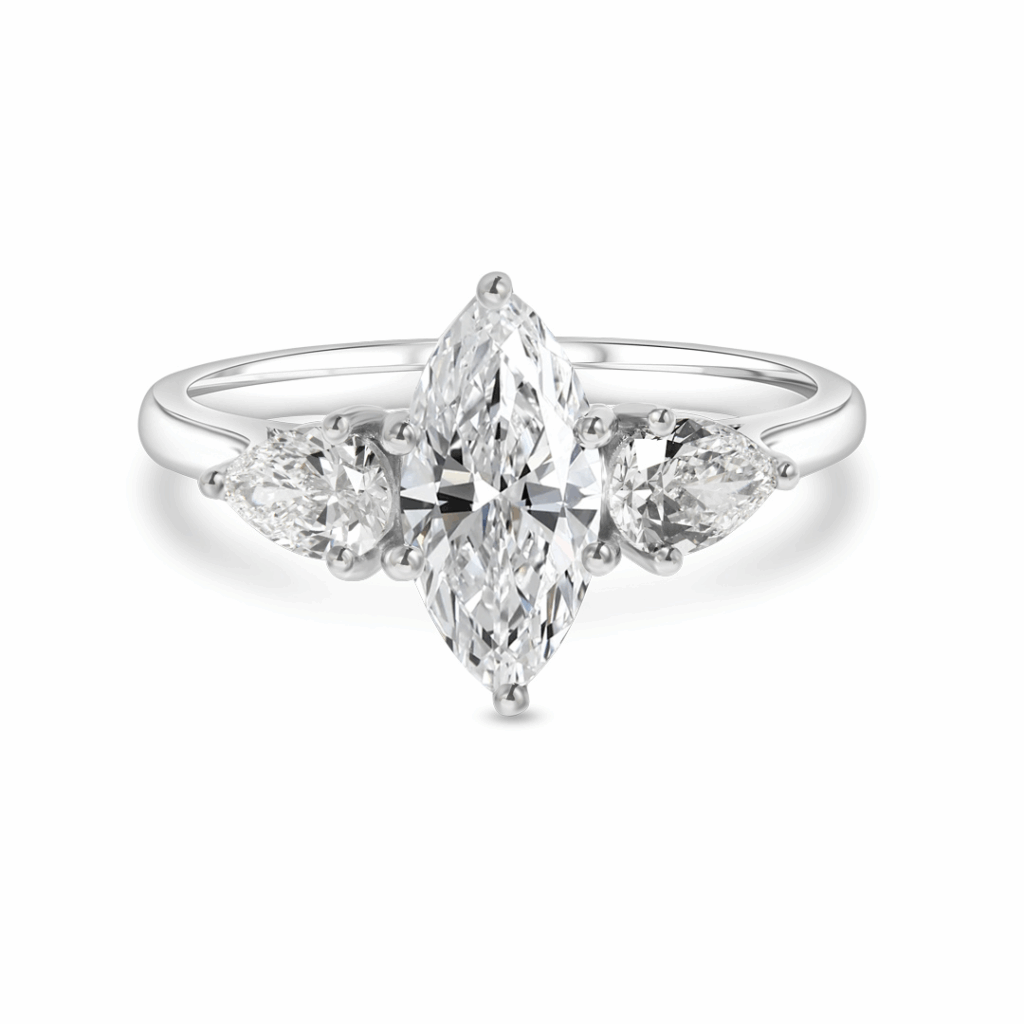 a Classic Three-stone Engagement Ring Featuring a Central Marquise-cut Diamond Flanked by Two Brilliant Pear-shaped Diamonds, Set in a Polished White Gold or Platinum Band.