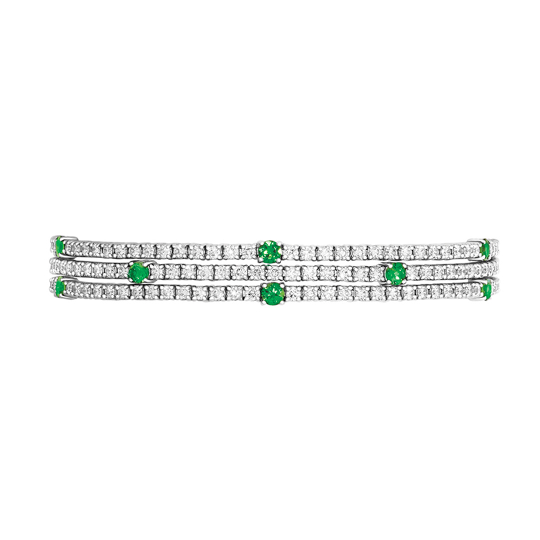 a Tri-strand White Gold Diamond Bracelet with Scattered Tsavorites.