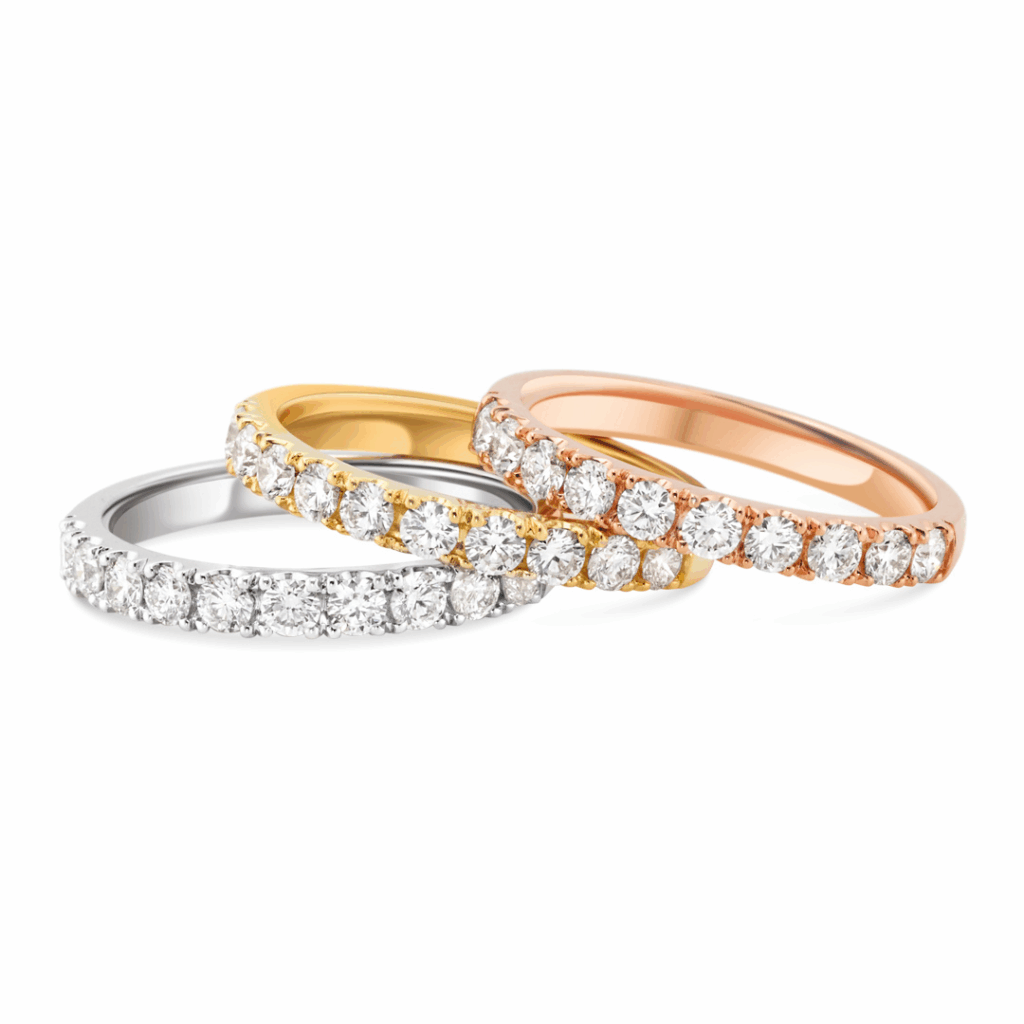 Wrg_eternity_bands_f6697-99-98 - Mark Solomon Jewellers Trio of Classic Claw-set Diamond Eternity Bands Stacked in 18ct White Gold, 18ct Yellow Gold, and 18ct Rose Gold.